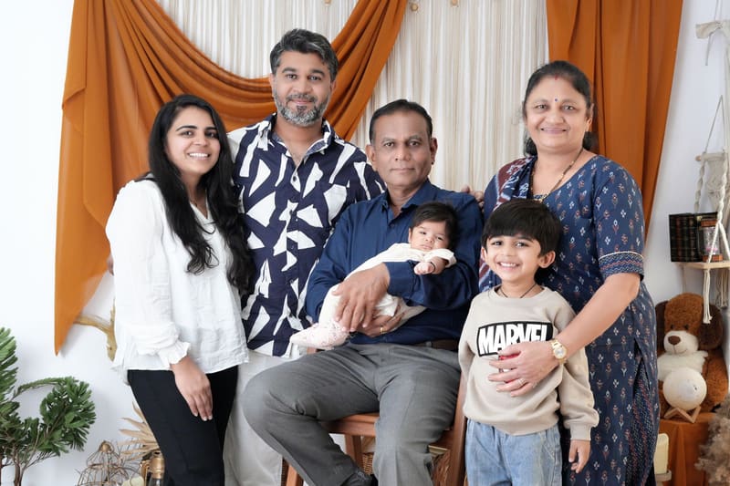 A large family at home, from grandparents to grandchildren