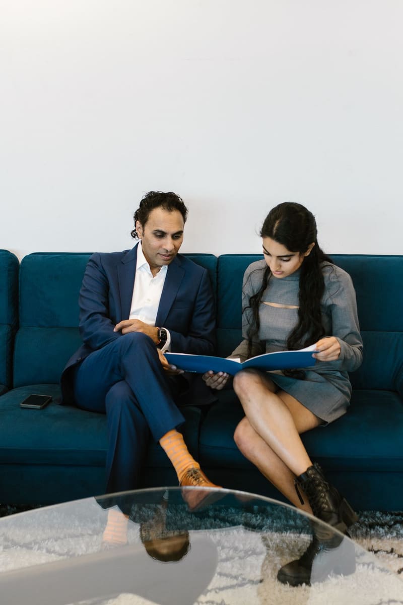 An advisor going through documents with a client